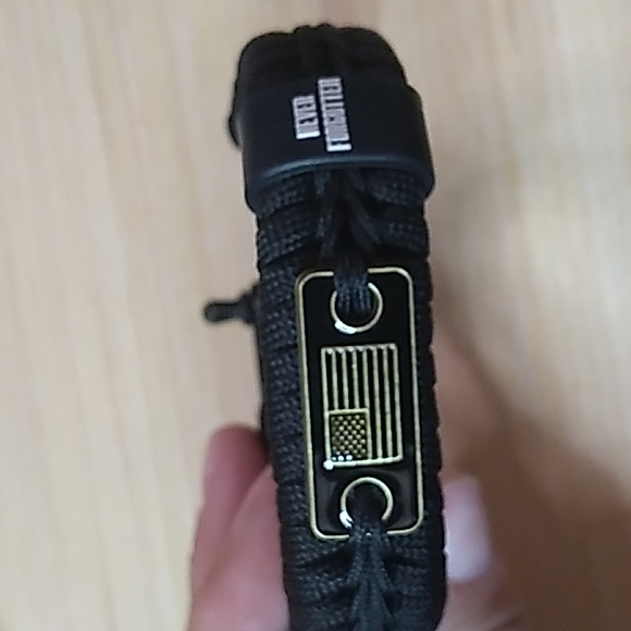 US Military Other - 9-10 inches black bracelet emergency cord w Metal flag & never forget on it